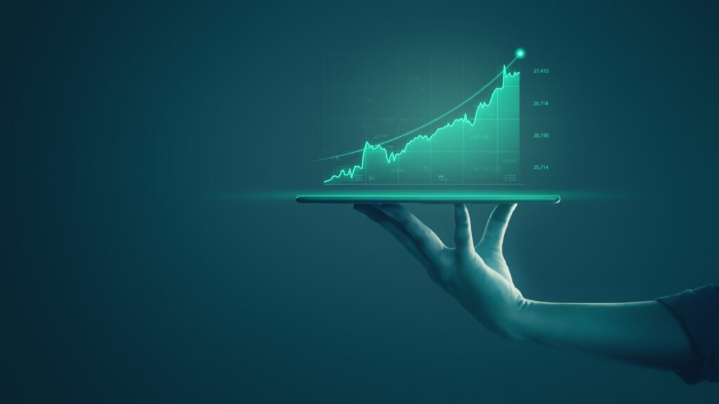 businessman-holding-tablet-and-showing-holographic-graphs-and-stock-market-statistics-gain-profits